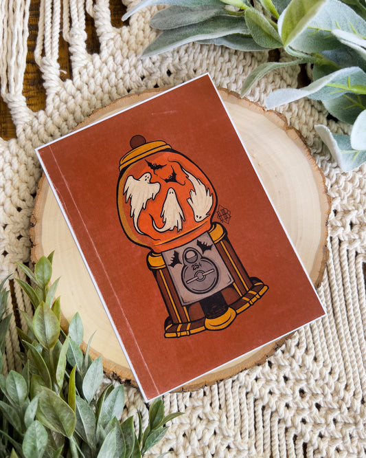 a gumball machine with ghosts and bats flying around in it art print