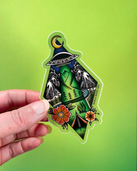 Decorative sticker with nature-themed alien abduction design on a green background