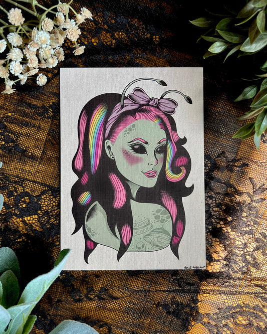 an art print of a green alien girl and rainbow and pink hair