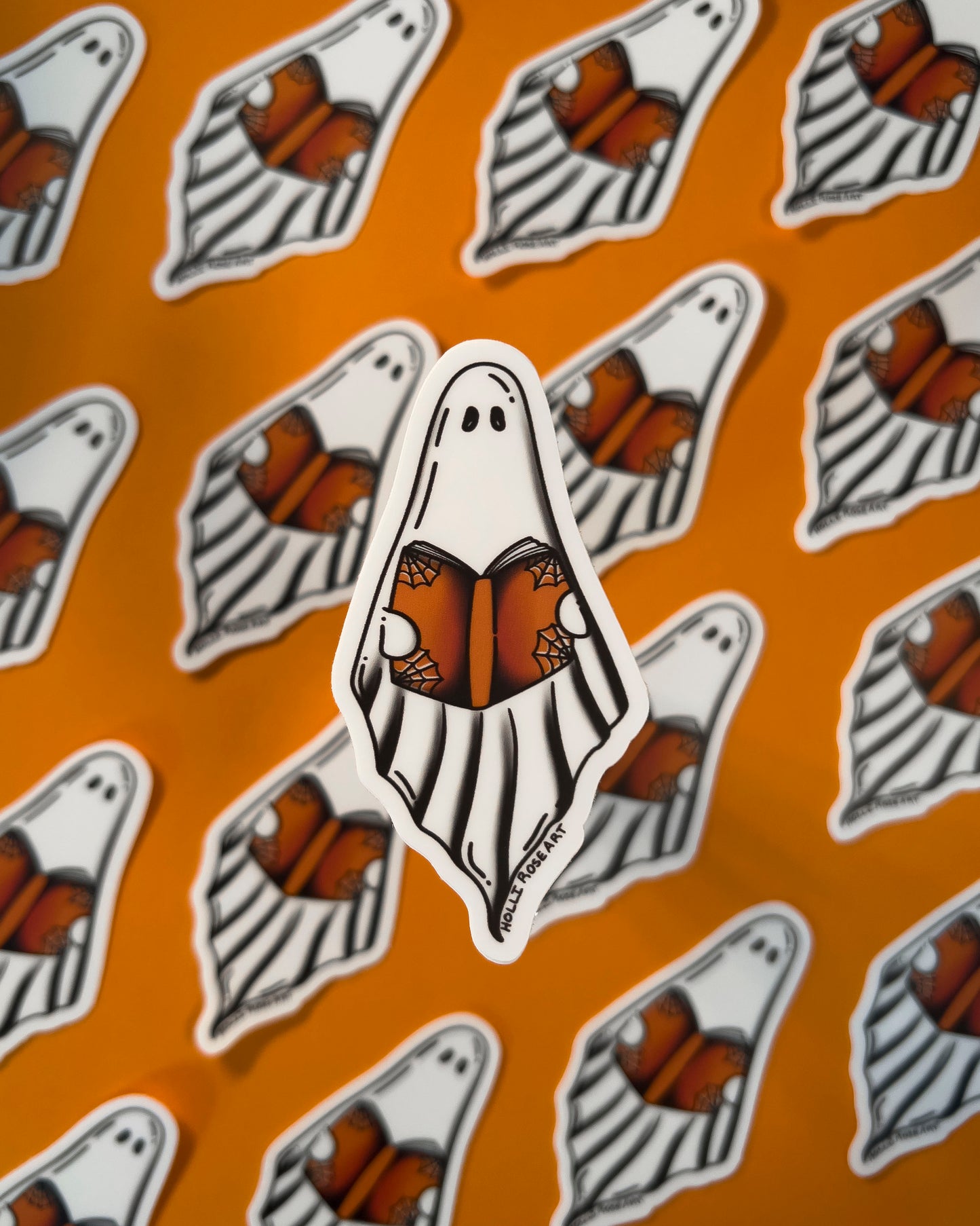 A Ghost reading a book sticker