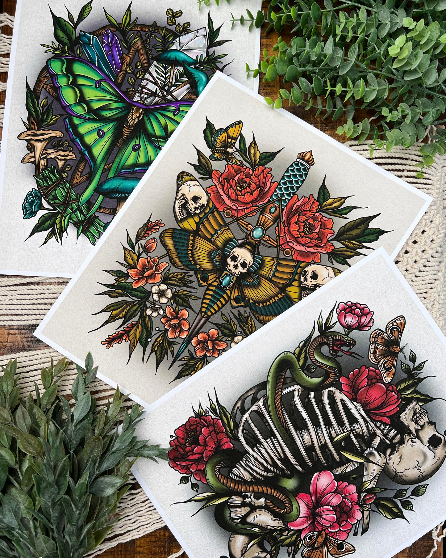 a collection of 3 art prints