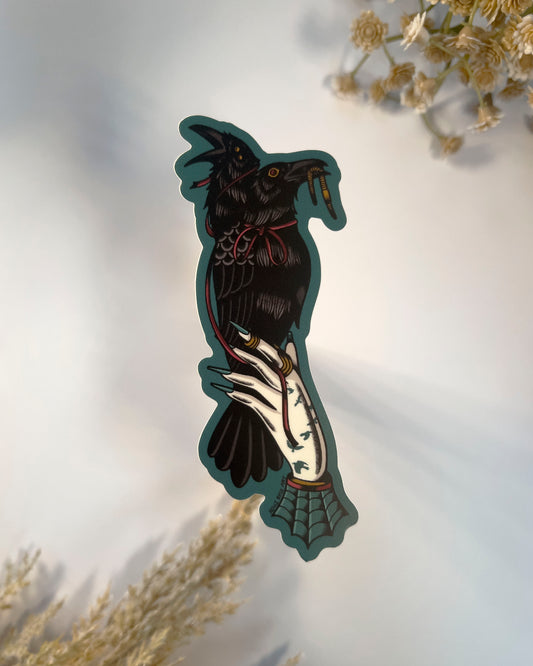 2 headed raven perched on a hand sticker