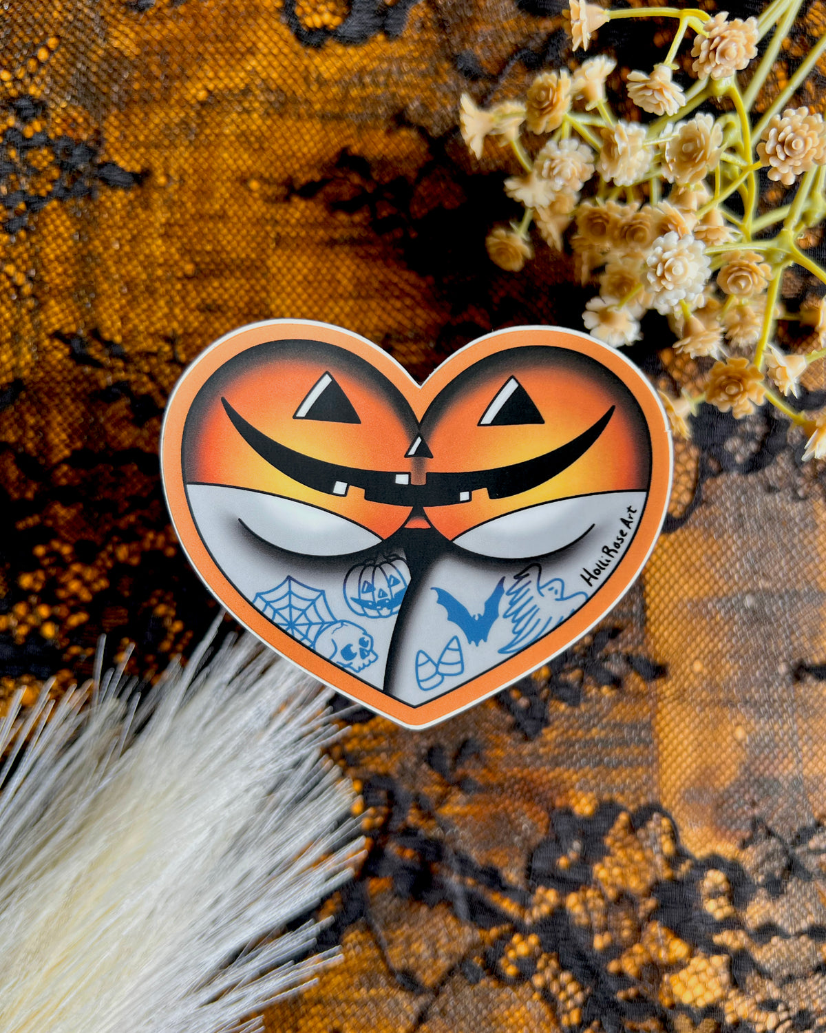 A booty wear halloween underwear in the shape of a heart and is a sticker