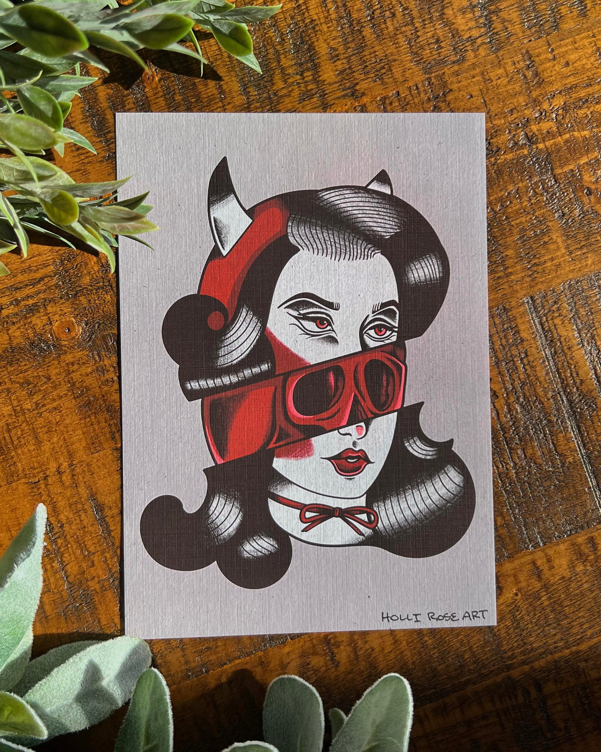 Art Print of a girl's face cut in half, showing a skull in the middle