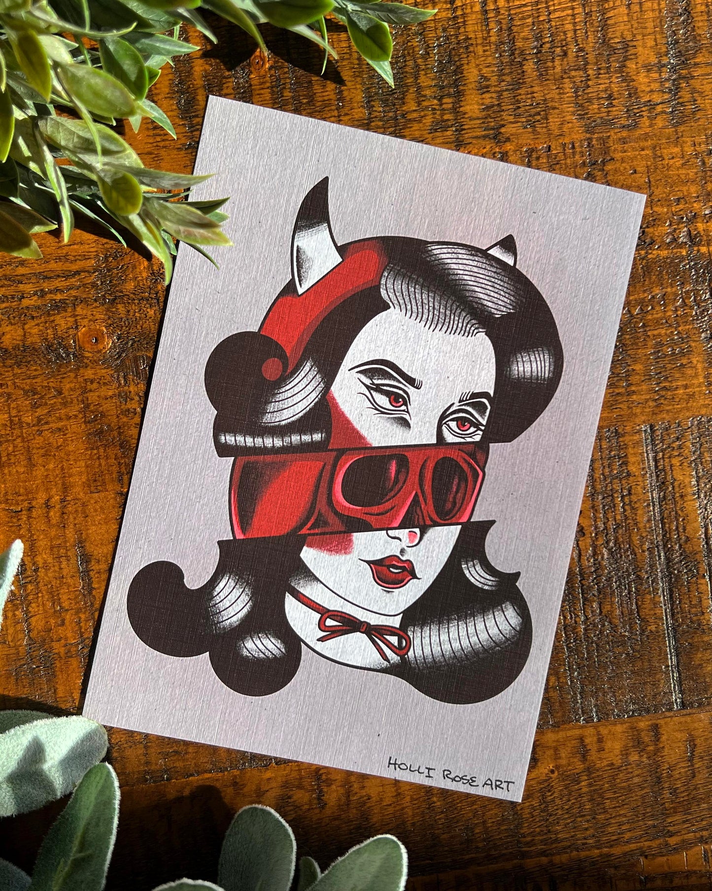 Art Print of a girl's face cut in half, showing a skull in the middle