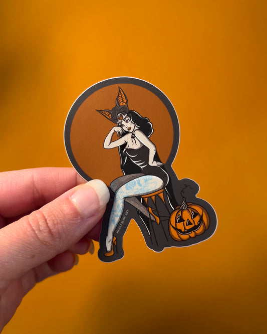 cartoon pinup girl wearing a bat mask on her head