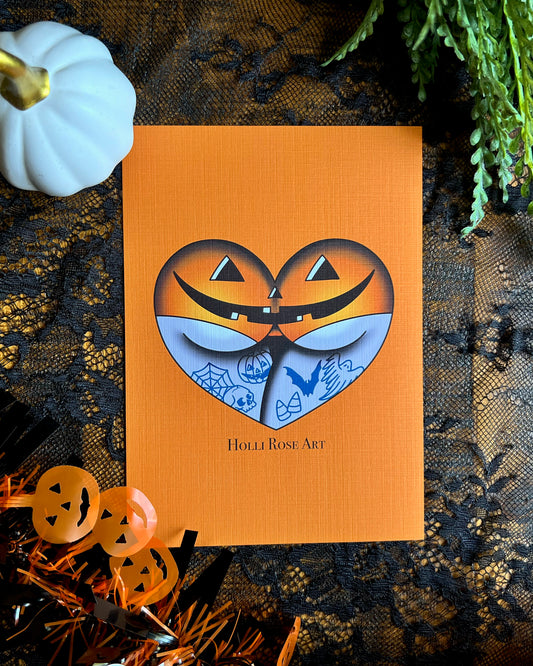 a print of a booty in the shape of a heart, wearing jack o lantern underwear
