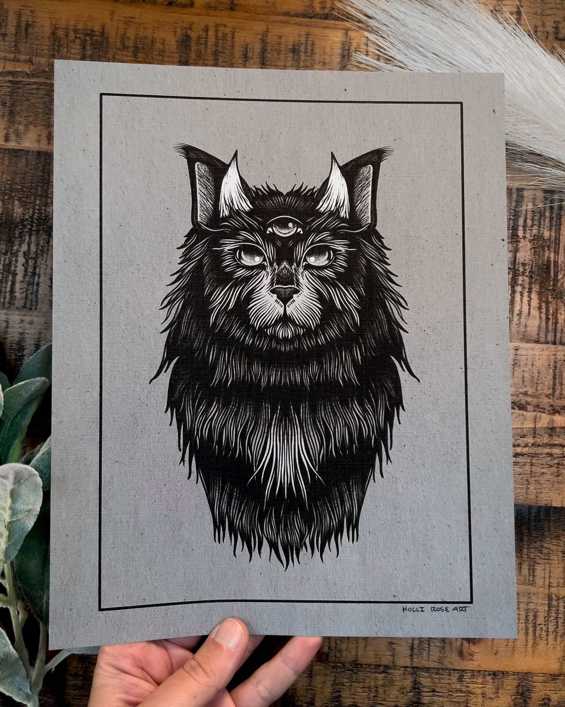 a cat with horns print