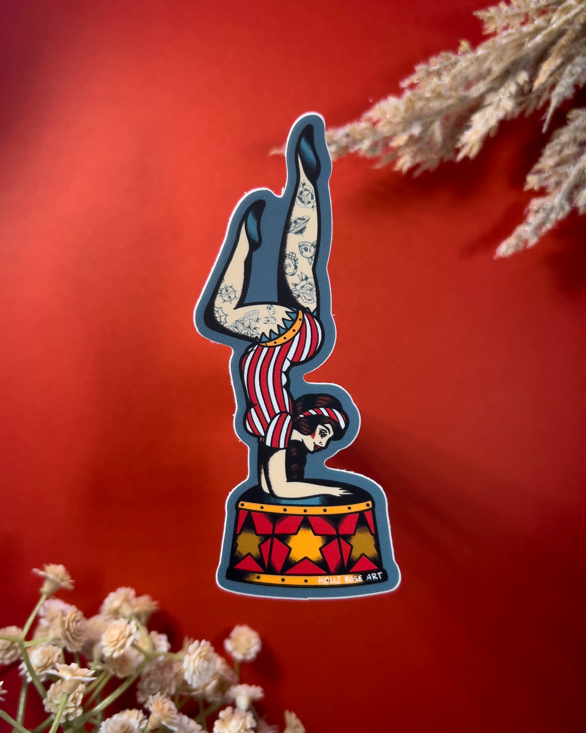 acrobat girl upside down with tattoos on her legs sticker 