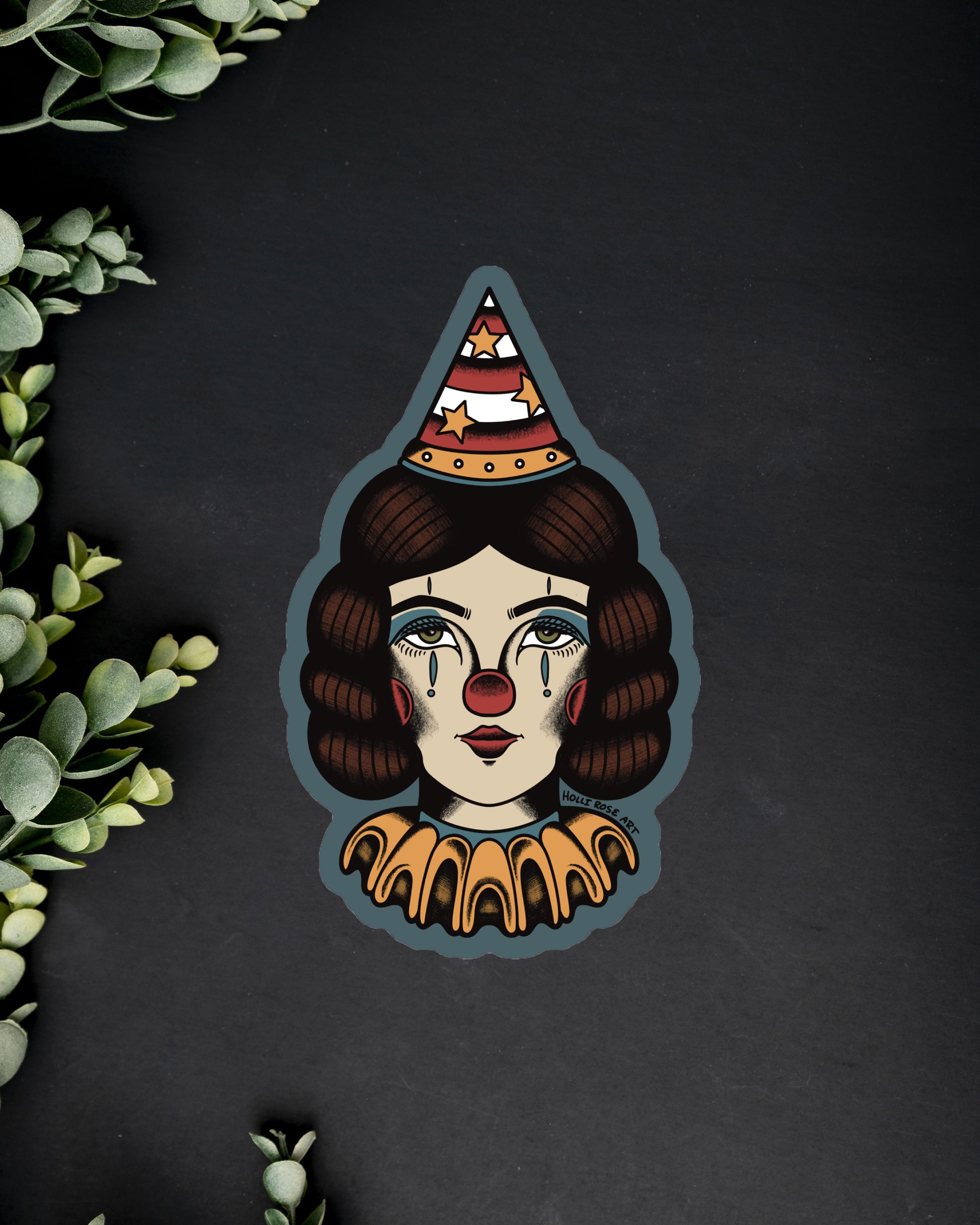 Sticker of a clown with a pointed hat on a dark background