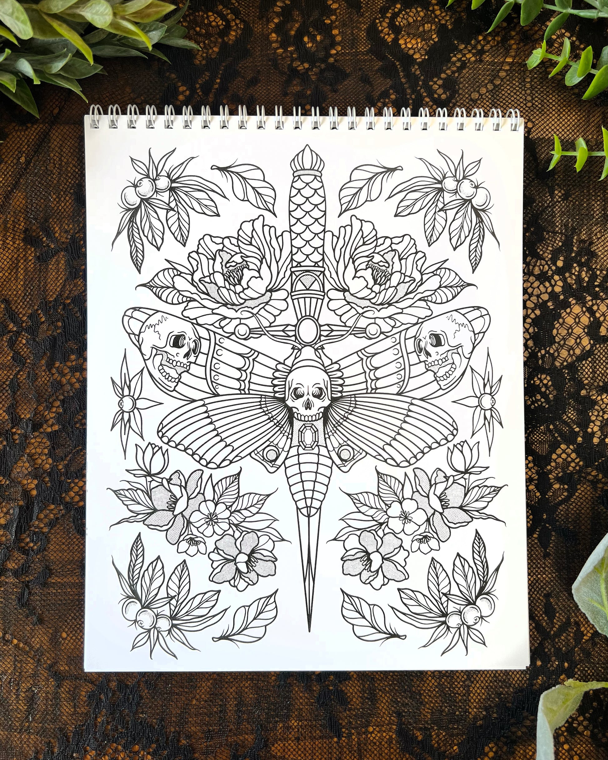 a coloring page with a death moth, dagger and flowers