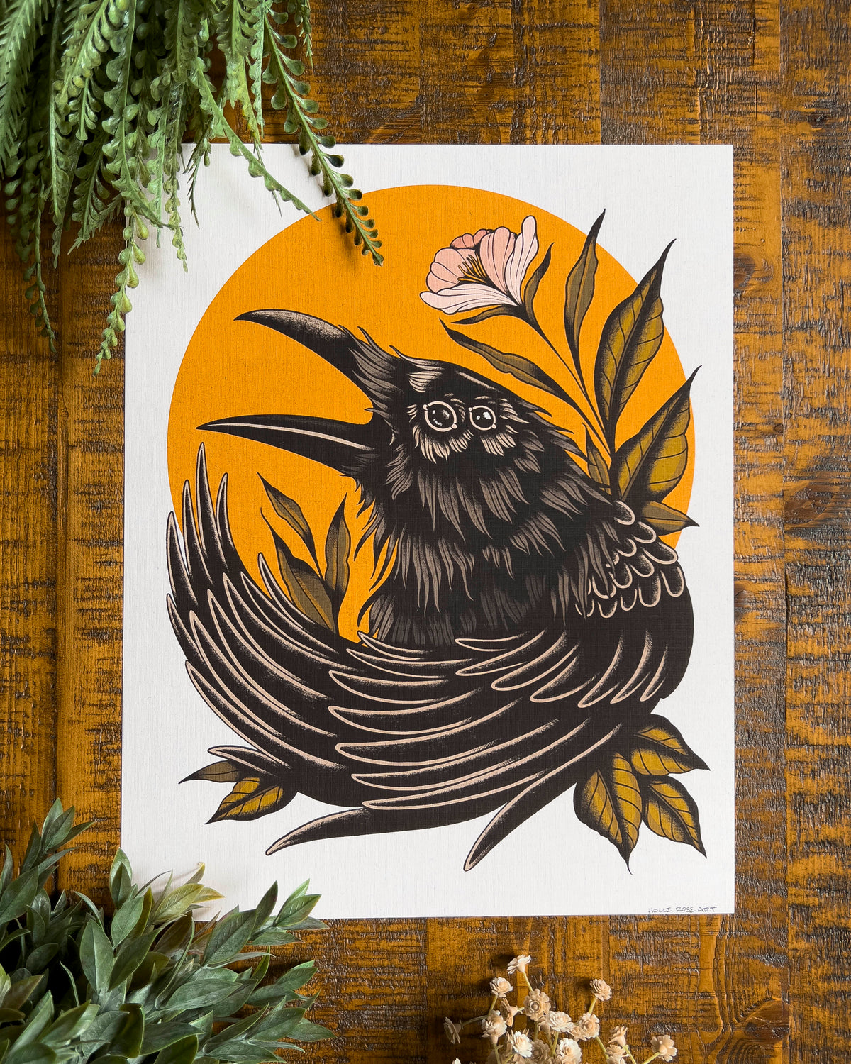 a print with a raven with double eyes 