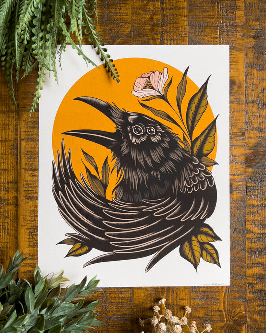 a print with a raven with double eyes 