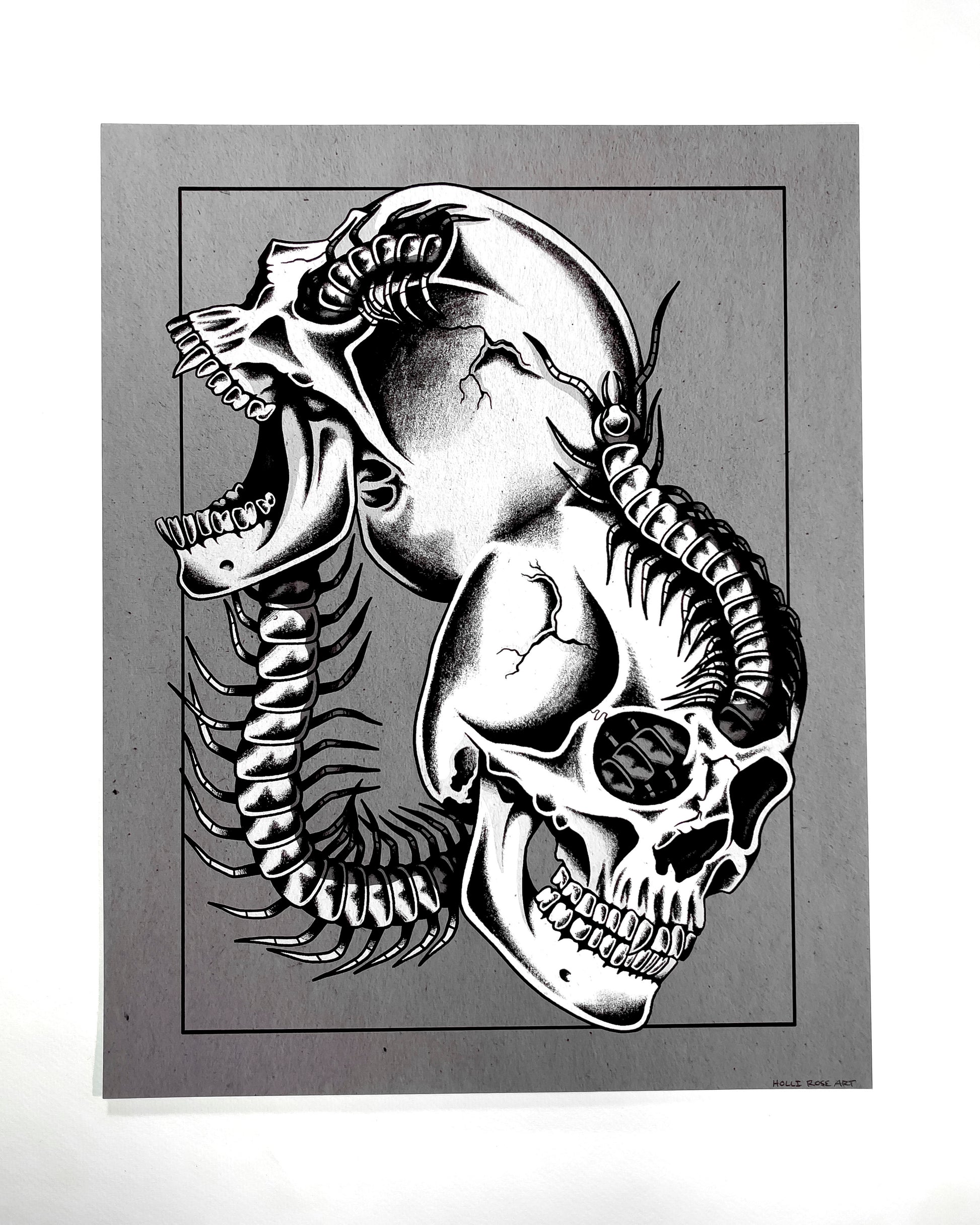 2 skulls combined with a centipede going through it print