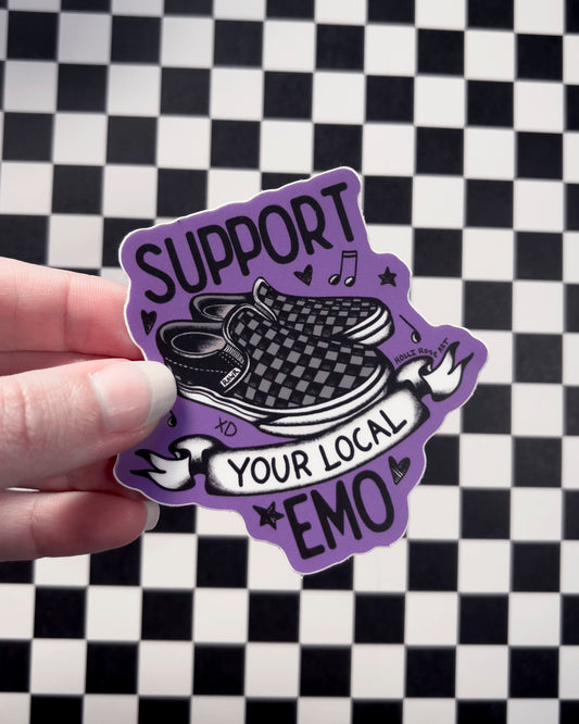 a sticker saying support your local emo with a pair of vans shoes