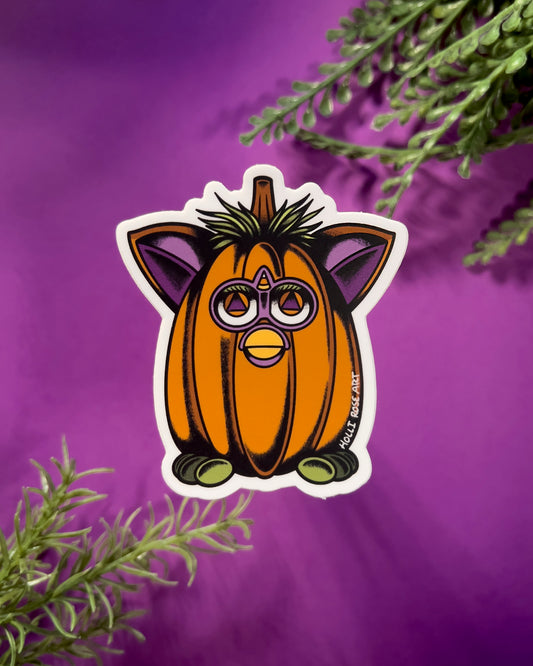 a little creature shaped as a pumpkin sticker 