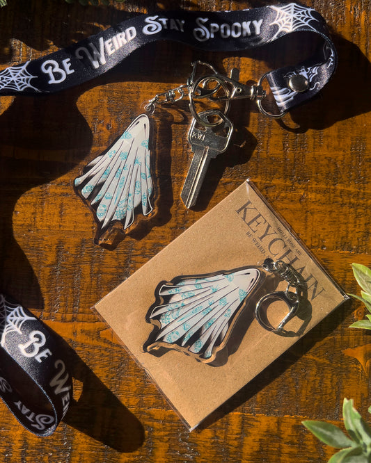 keychain of a ghost with tattoos