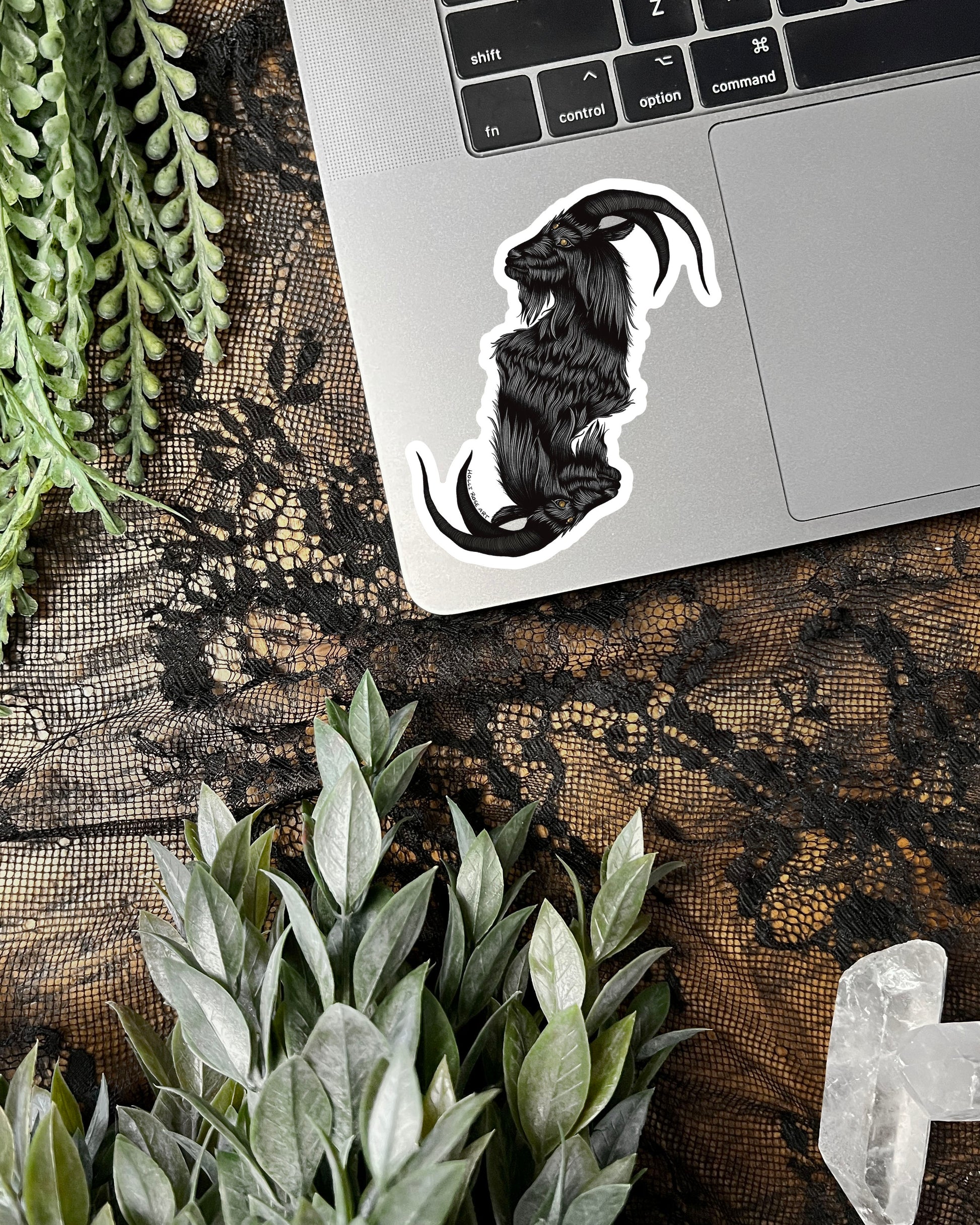 a sticker with a double headed goat 