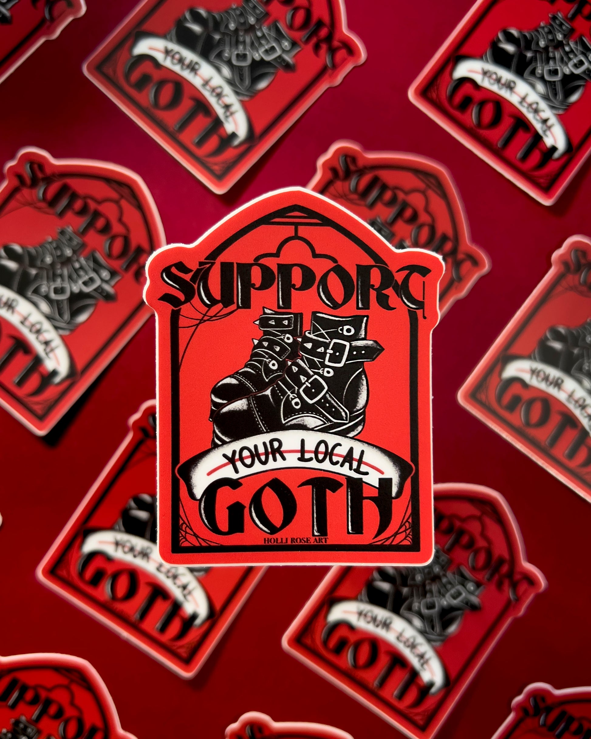 a sticker that says support your local goth with black goth boots