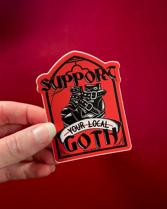 a sticker that says support your local goth with black goth boots