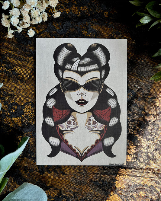 a goth girl wearing bat glasses with pinup haired skull tattoos on her neck. This is an art print