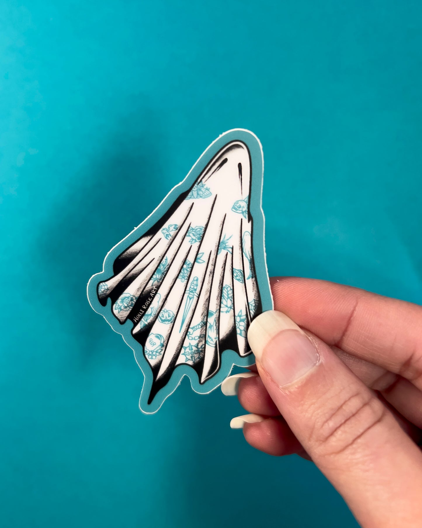sheet ghost sticker with blue tattoos