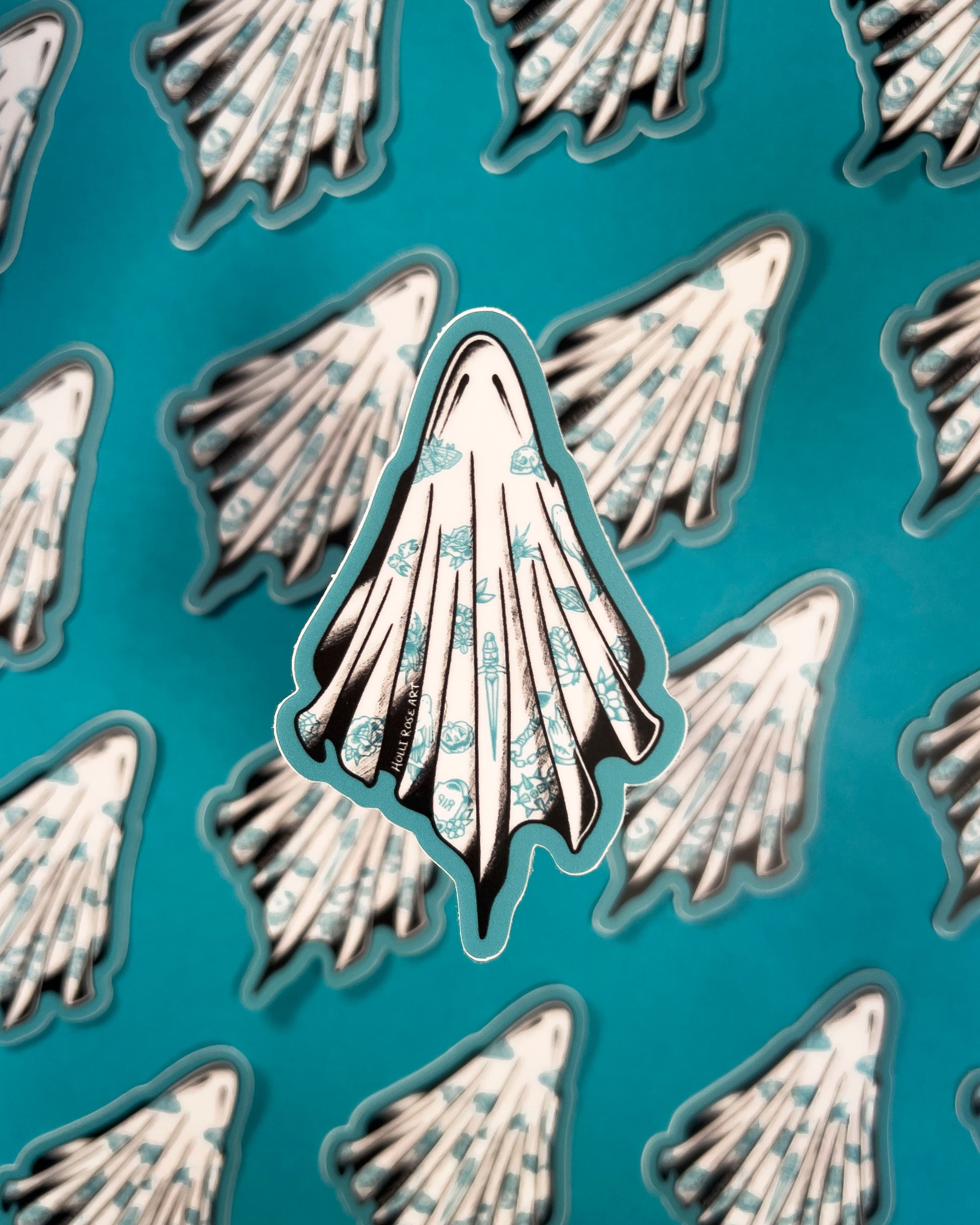 sheet ghost sticker with blue tattoos