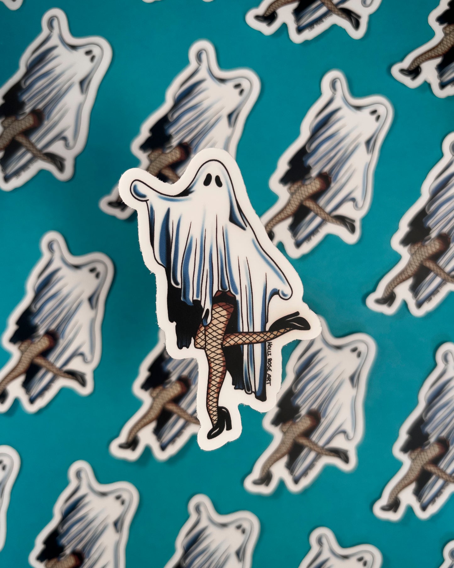 Sticker of a ghost in fishnet stockings on a teal background with flowers and leaves.