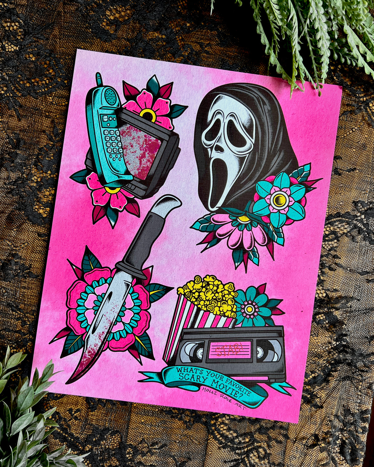 a horror movie print in black or pink