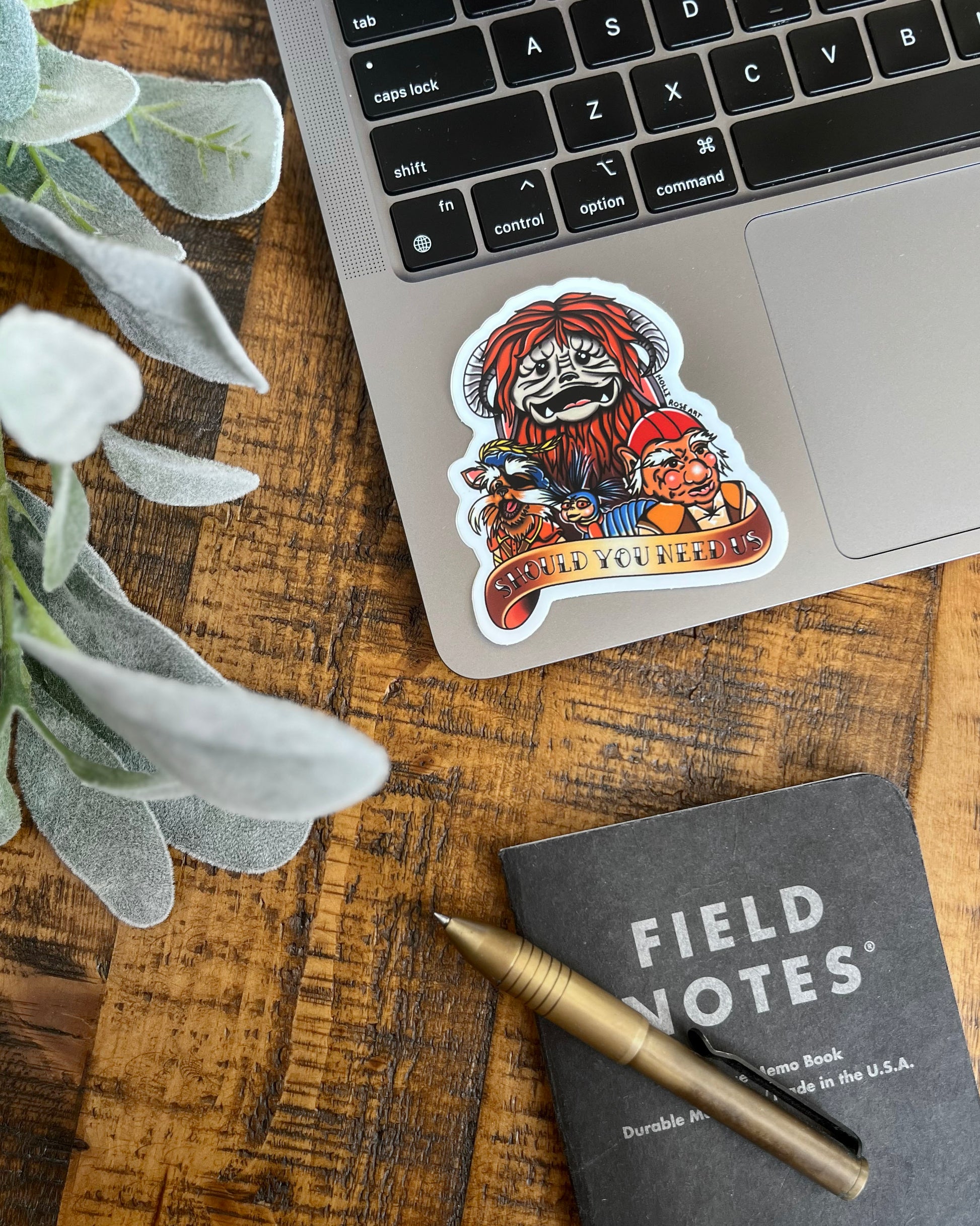 sticker with labyrinth characters and they saying "should you need us"