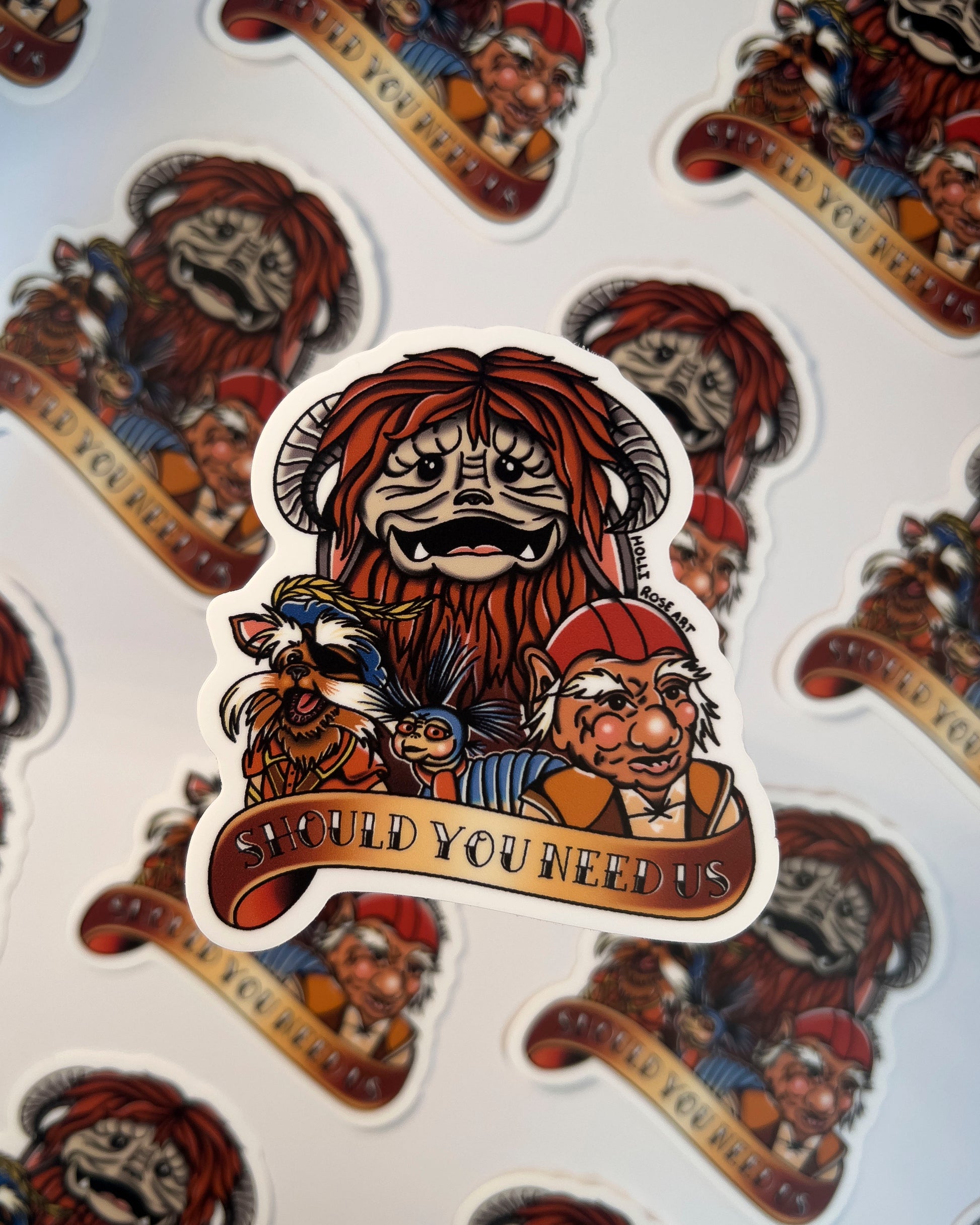 sticker with labyrinth characters and they saying "should you need us"