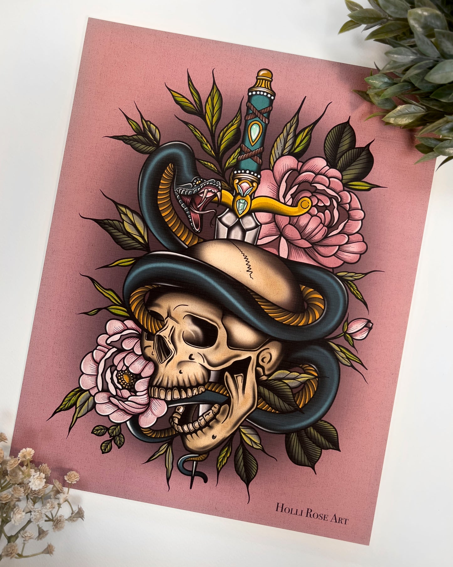 art print with a dagger, skull and snake