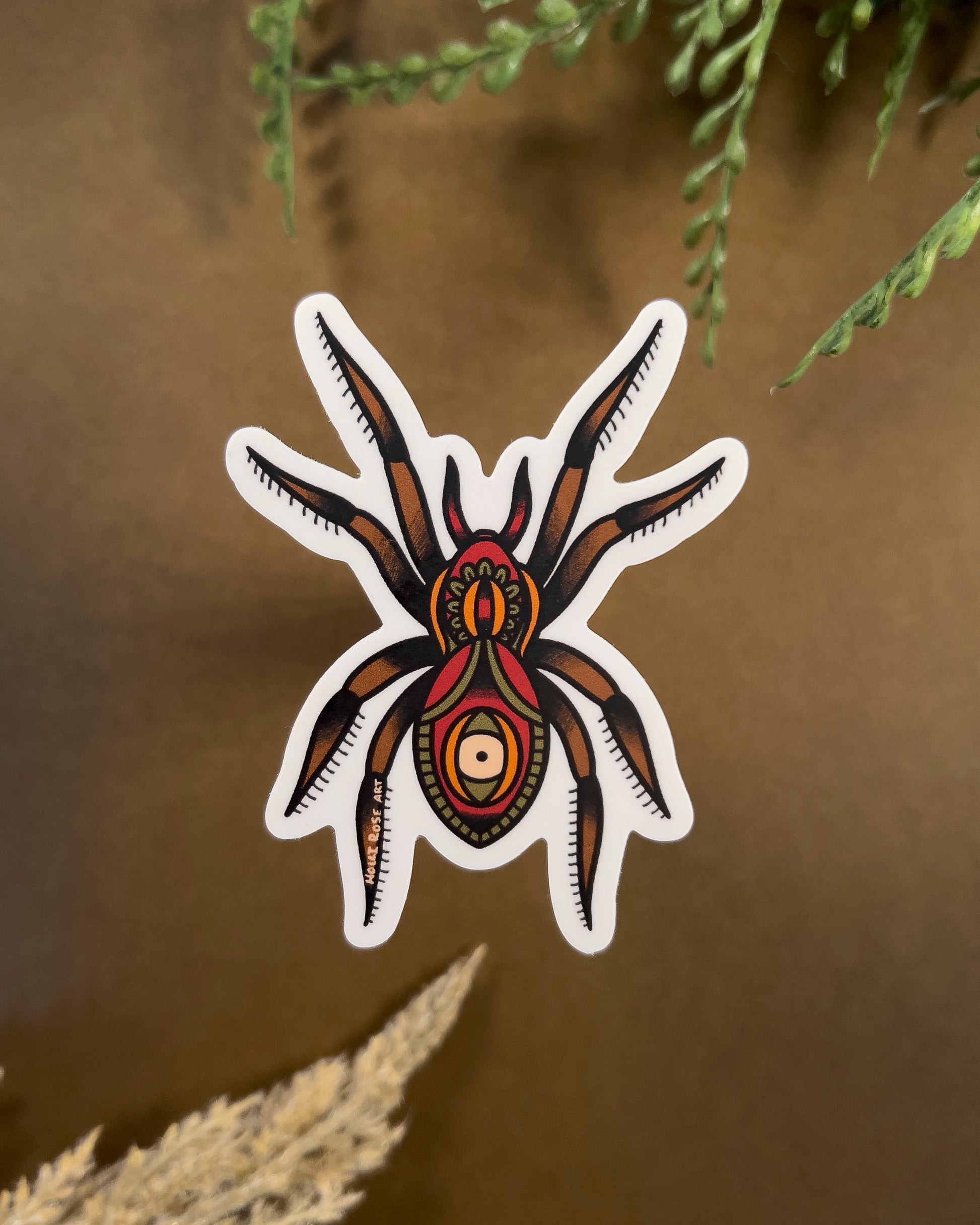 sticker of an American traditional tattoo spider