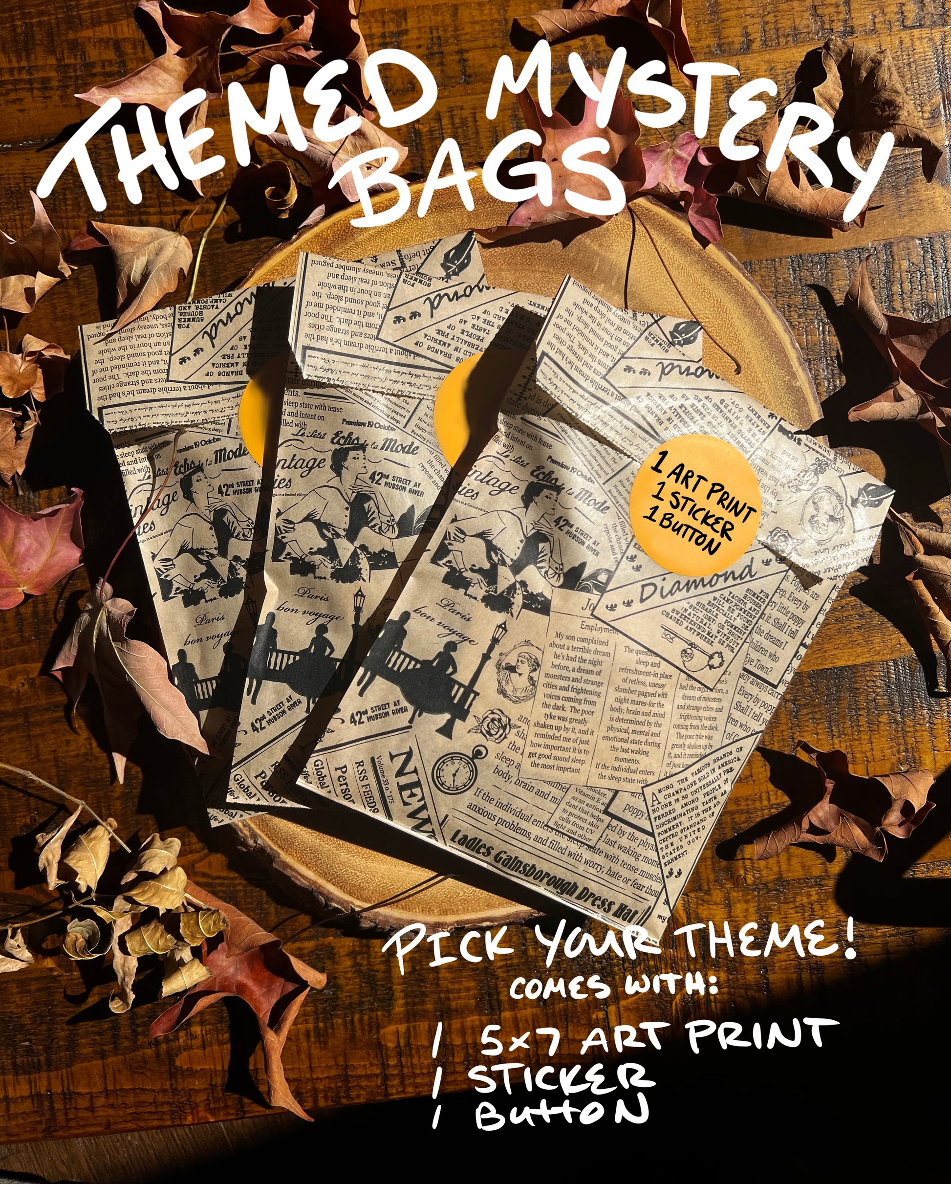 Three themed mystery bags with a vintage newspaper print design, displayed on a wooden surface surrounded by autumn leaves. The bags are marked with tags indicating they come with an art print, sticker, and button.
