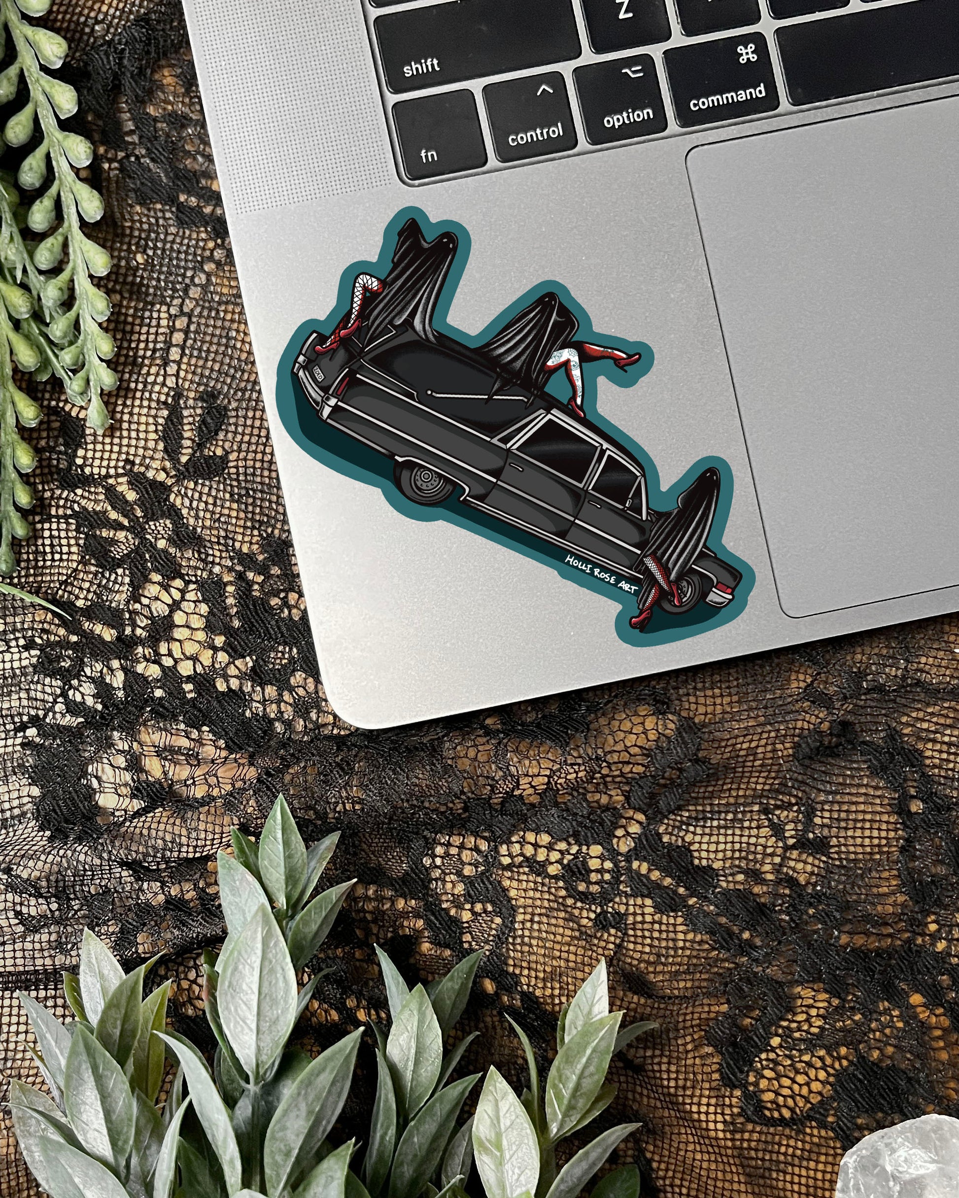 a hearse with 3 sexy ghost girls on it sticker