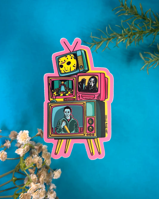 A sticker with tvs stacked and horror characters in pink, blues and yellows