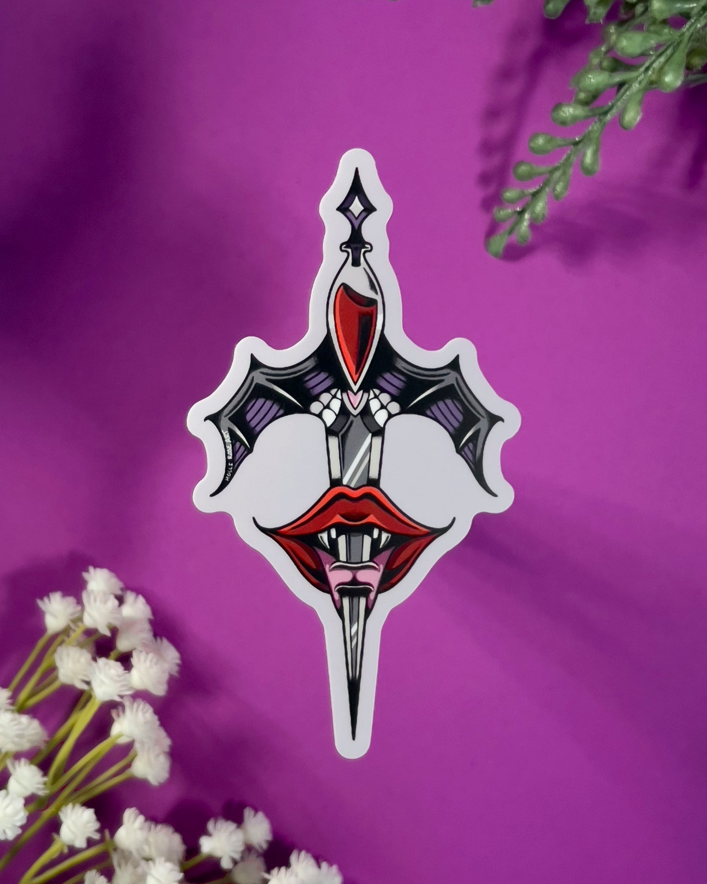 Decorative sticker with a design of a sword, heart, and lips