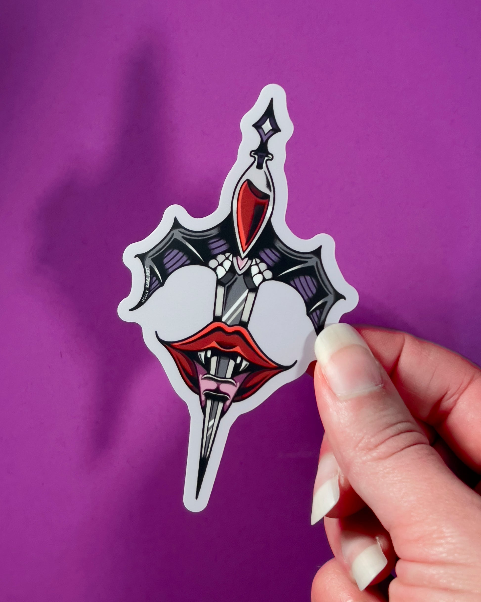 Decorative sticker with a design of a sword, heart, and lips