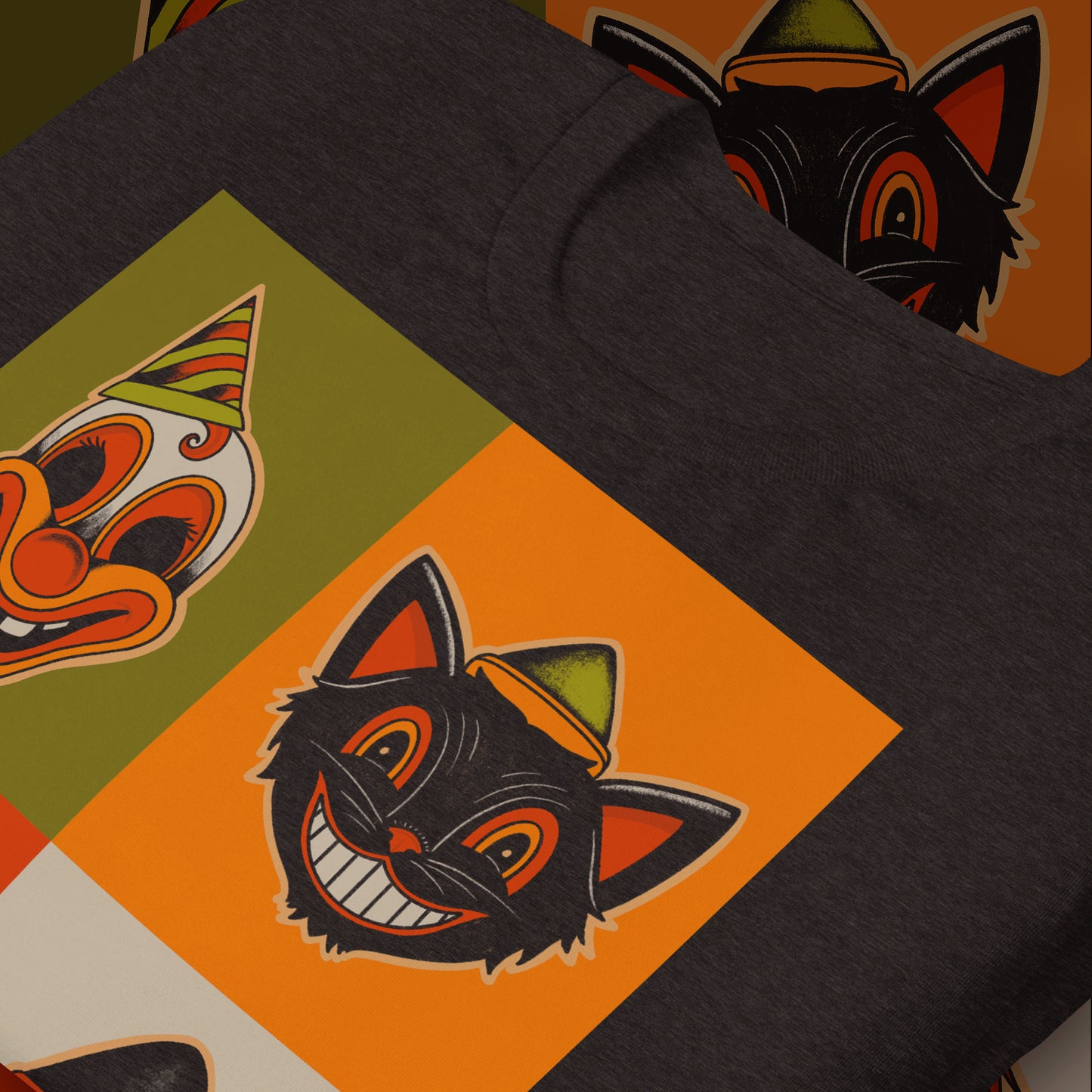 A dark grey t-shirt featuring a square arrangement of four different classic Halloween mask designs, including a pumpkin, a clown, a witch, and a cat