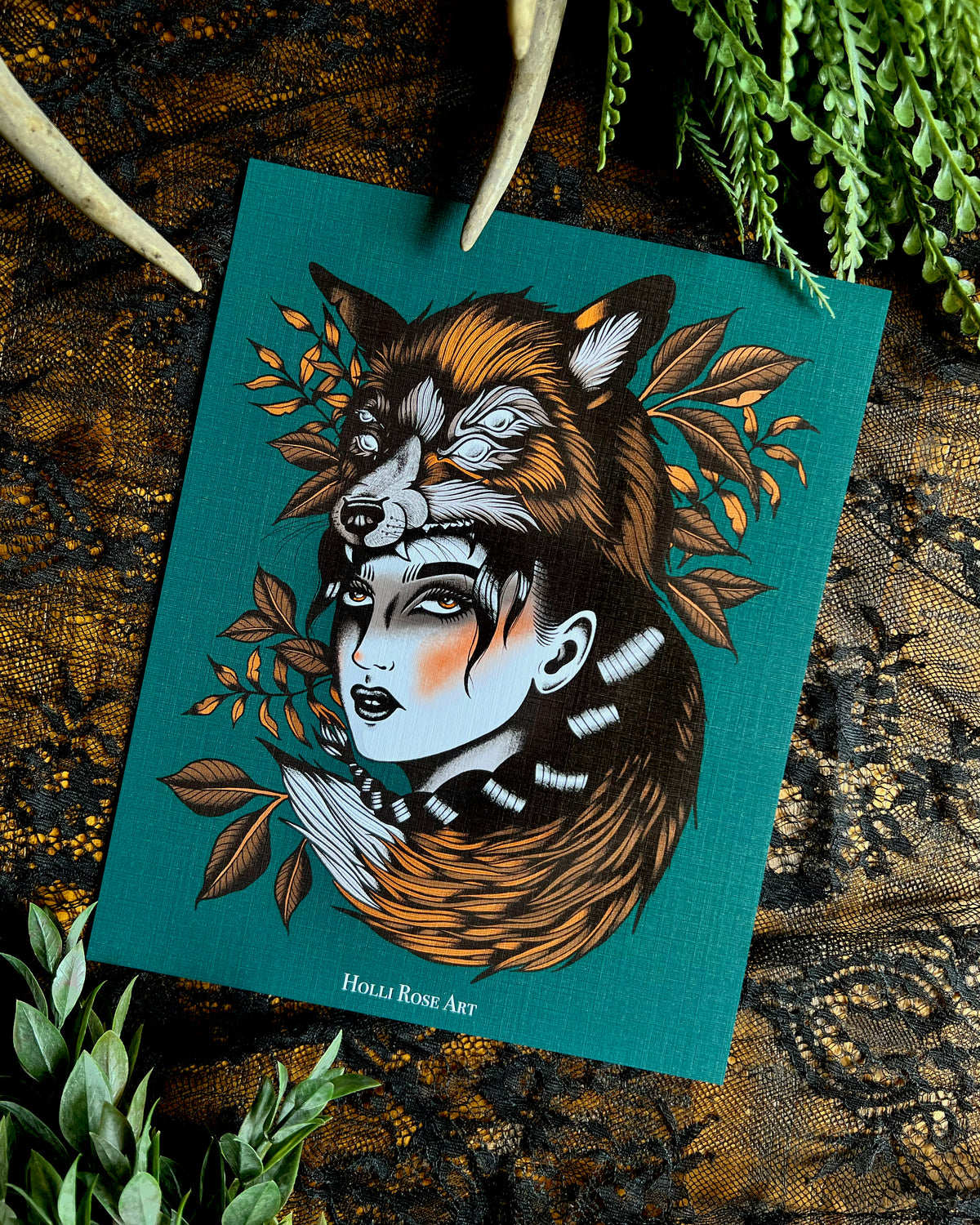 a print with a girl wearing a double eyed fox on her head