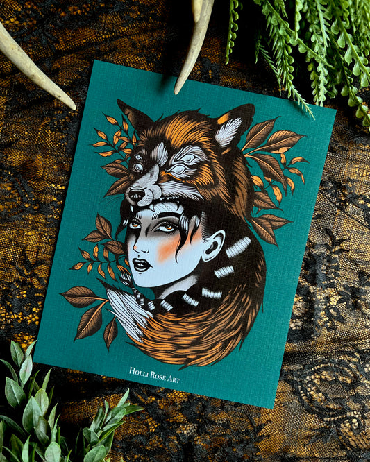 a print with a girl wearing a double eyed fox on her head