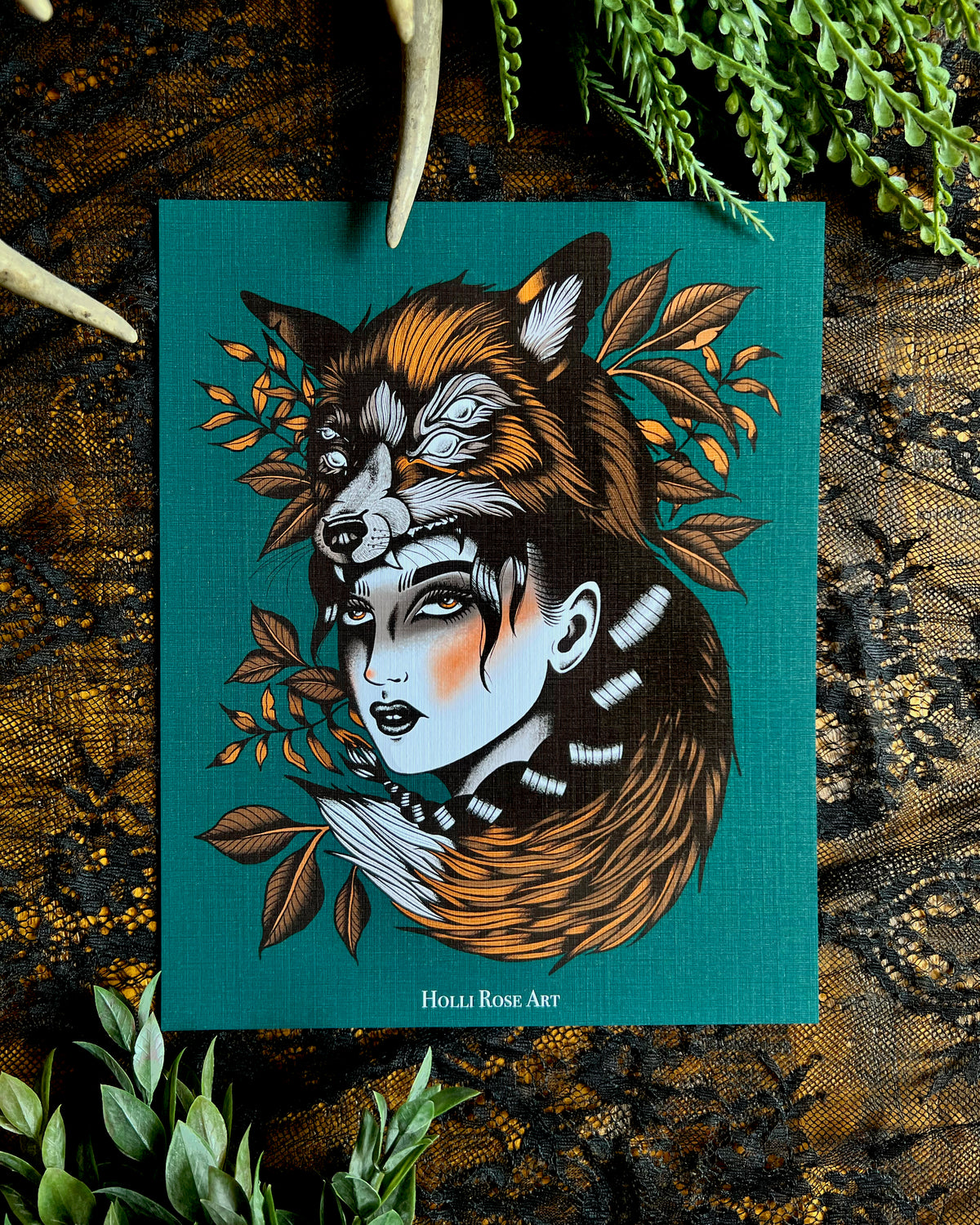 a print with a girl wearing a double eyed fox on her head