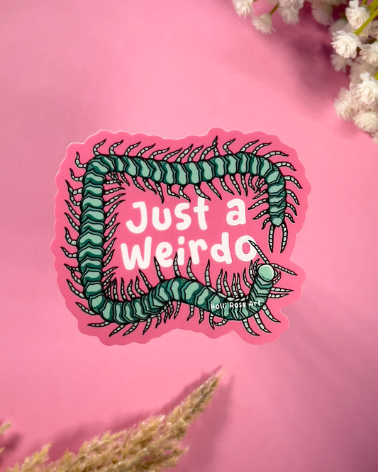 Sticker with a centipede design and 'Just a Weirdo' text on a pink background