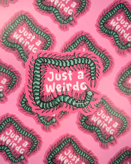 sticker with a green centipede with 'Just a Weirdo' text on a pink background